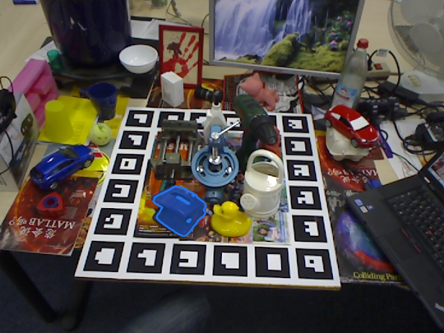 LM-O scene 2 image 1: the supplied visible mask of the holepuncher, highlighted in blue