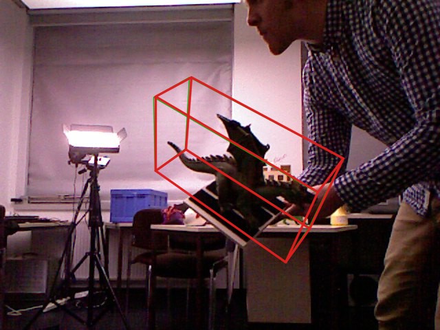 TUD-L scene 1 image 5481, predicted pose in red and ground truth in green